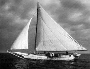 [photograph of skipjack under sail on Chesapeake Bay]